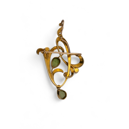 2 - British, Art NouveauA yellow split pearl and peridot brooch pendant of naturalistic scroll design, s... 