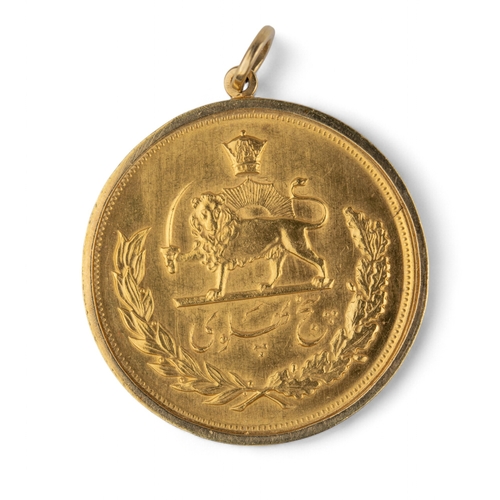 5 - PersianCirca 1970A gold coin pendantWeight: Approx. 46.12 gramsDimensions: 4 cm. (D)... 