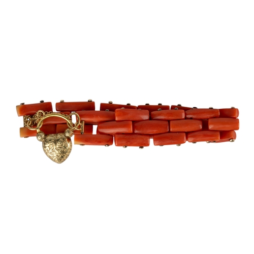 12 - British, 19th centuryA coral and gold bracelet. The three row brick link coral bracelet of fine colo... 