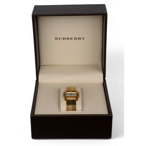 36 - BurberryA ladies gold-plated bracelet wrist watch with a rectangular dial in its original box and ou... 