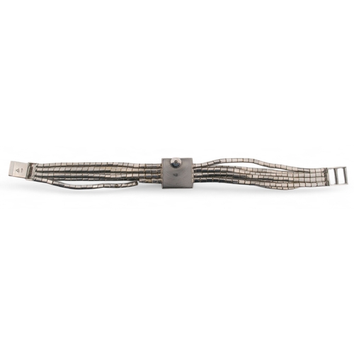 39 - SarcarContinentalCirca 1970An 18 carat white gold and diamond set back wind lady's bracelet wristwat... 