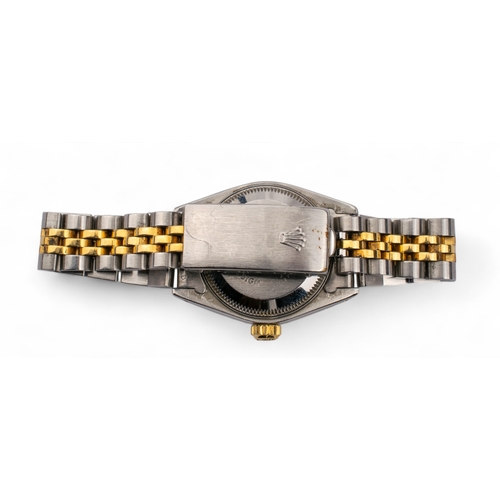 47 - RolexA Datejust 26 bi-colour ladies' watch with a champagne baton dial housing, surrounded by a... 