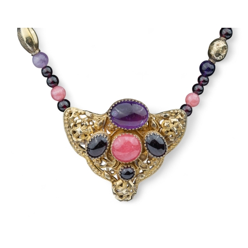 57 - Eileen CoyneAmericanContemporaryAn amethyst, rose quartz and garnet sautoir pendant necklaceThe fron... 