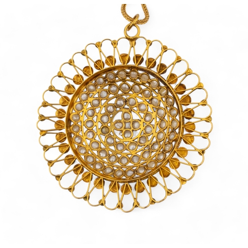 65 - ContinentalCirca 1960A natural pearl and yellow gold wirework pendant necklaceWith a yellow gold che... 