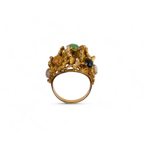 70 - Continental, Circa 1970sA multicoloured jadeite and gold dress ring.A naturalistic yellow gold ring ... 