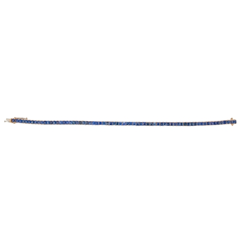 86 - Italian, Contemporary,A highly flexible and finely mounted square-cut sapphire line bracelet.Mounted... 