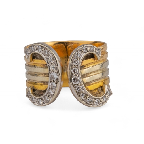 130 - CartierParisCirca 1970A three colour gold and diamond set dress ringSigned Cartier ParisRing size: J... 