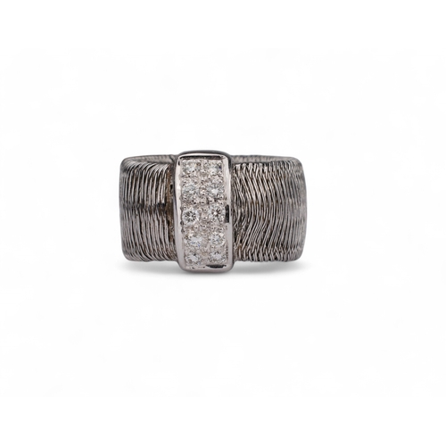 131 - Continental, ContemporaryAn unusual diamond and silver-coloured metal mesh dress ring.Finger size: J... 