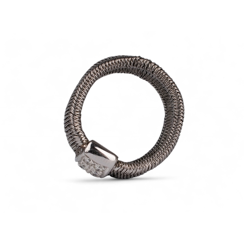 131 - Continental, ContemporaryAn unusual diamond and silver-coloured metal mesh dress ring.Finger size: J... 