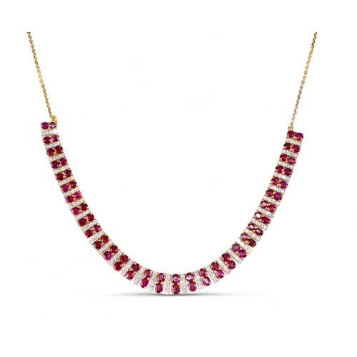 136 - Continental, Circa 1980s,An attractive ruby and diamond line fringe necklace.The front set with 64 s... 