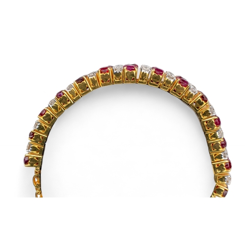 138 - Continental, Circa 1980sAn attractive diamond two-row bracelet, set to the front with 28 oval-shaped... 