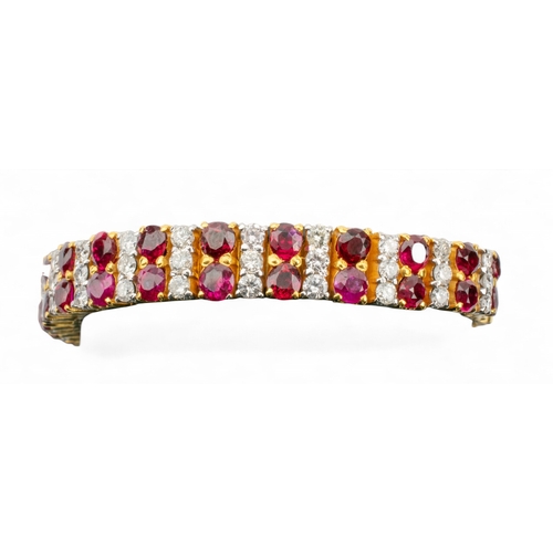 138 - Continental, Circa 1980sAn attractive diamond two-row bracelet, set to the front with 28 oval-shaped... 