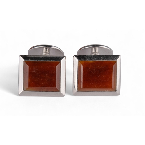 148 - DunhillA pair of 18 carat white gold and carnelian cufflinks. In original fitted Dunhill burr walnut... 