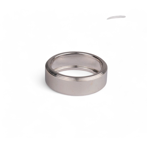 151 - Tiffany & Co., ItalyCirca 2004An 18 carat white gold band ring. The satin textured central band ... 