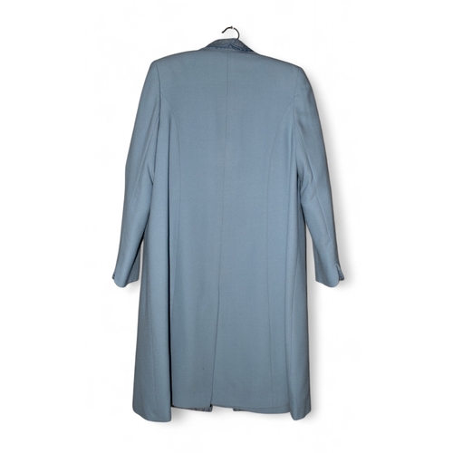 159 - A Tomasz Starzewski powder blue ensemble comprising: a coat and matching dress1980sWorn by Baroness ... 