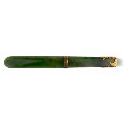 167 - FabergéA jade letter opener with gold foliate design and ringHallmarked Mikhail PerkhinProvenance:Si... 