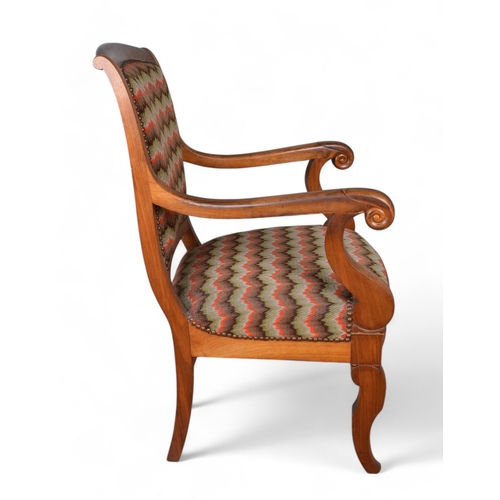 190 - FrenchCirca 1820A pair of walnut fauteuilsWith needlepoint upholsteryProperty of a gentlemanFrom the... 