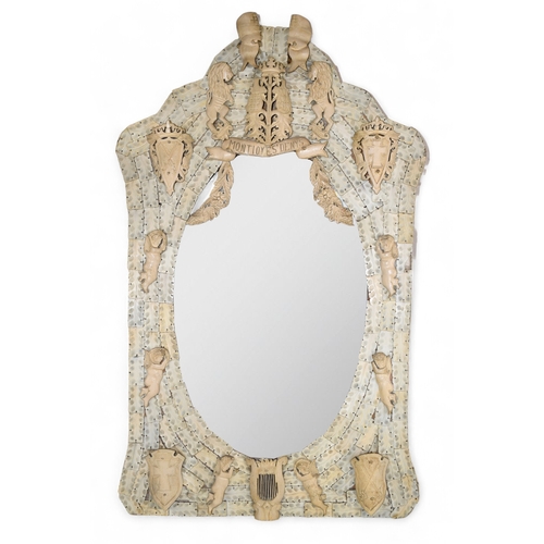 221 - Dieppe19th CenturyAn unusual pair of carved whale bone mirrorsThe bevelled mirror plates set within ... 