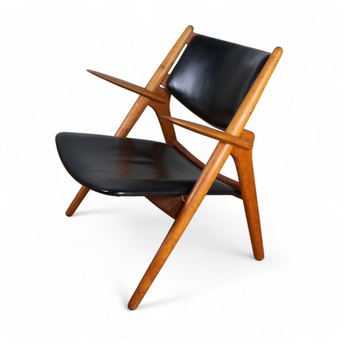 232 - Circa 1950s, Hans Wegner for Carl Hansen & SonA sawbuck chair model CH28Oak and black leatherDim... 