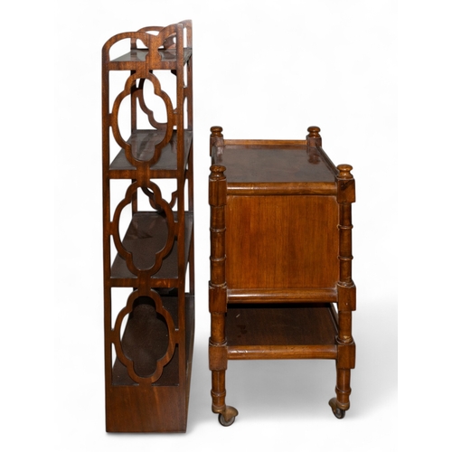 236 - 19th CenturyA walnut (?) magazine stand on brass wheelsTogether with a wall-mounted bookshelfTo be s... 