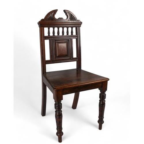 242 - Victorian19th centuryA pair of Gothic hall chairsOakDimensions:35 in. (H) x 17 in. (W) x 15 in. (D)... 