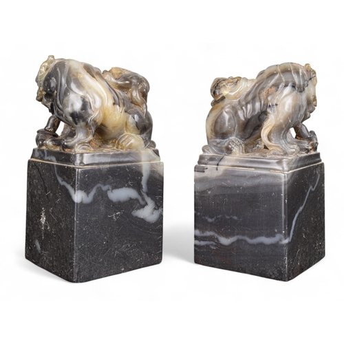 337 - Chinese19th CenturyPair of soapstone foo dogsProperty of a gentlemanFrom the collection of Peter Roe... 