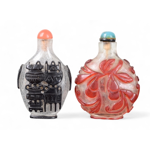 339 - Chinese19th CenturyPeking glass cameo snuff bottlesOne black and natural crystal with precious objec... 