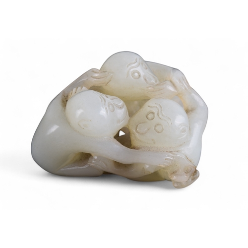 341 - ChineseCirca 19th CenturyThree mutton fat jade playful monkeys and a rebus of even colourProperty of... 