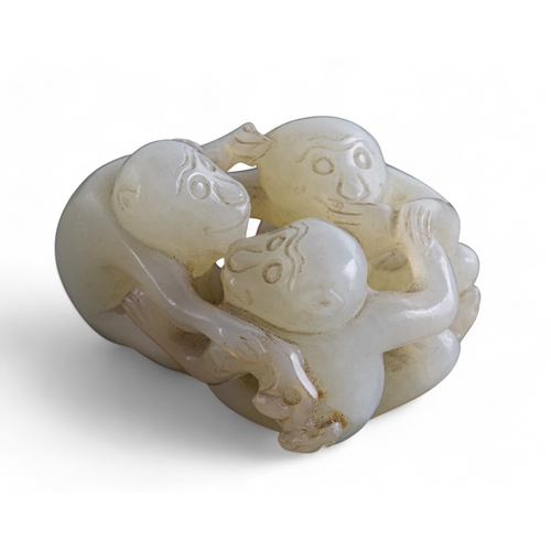 341 - ChineseCirca 19th CenturyThree mutton fat jade playful monkeys and a rebus of even colourProperty of... 