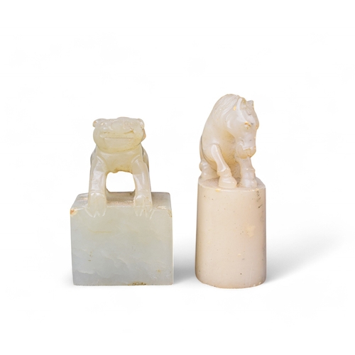 351 - ChineseLate 19th CenturyTwo mutton fat coloured jade seals of a horse and a kylinProperty of a gentl... 