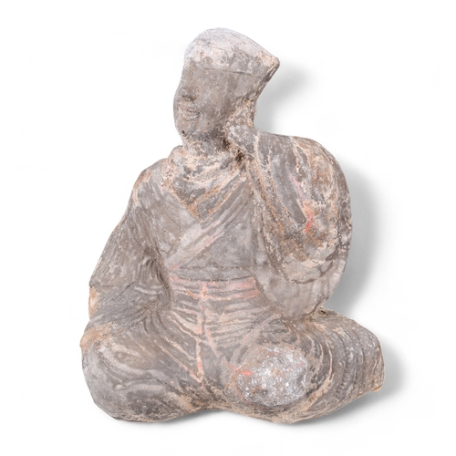 361 - Chinese, Han Dynasty A terracotta figure of a singer, unglazed with remnants of polychrome ... 