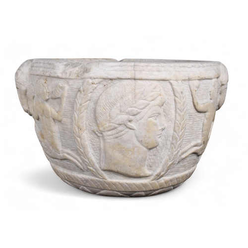 366 - 19th centuryA carved stone mortar in neoclassical style, depicting portraits of Roman emperors flank... 