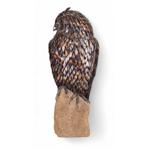 396 - Tim Cotterill (British, b. 1950)An owl1976Welded metal and glass on stoneSigned 'T H Cotterill 76' P... 