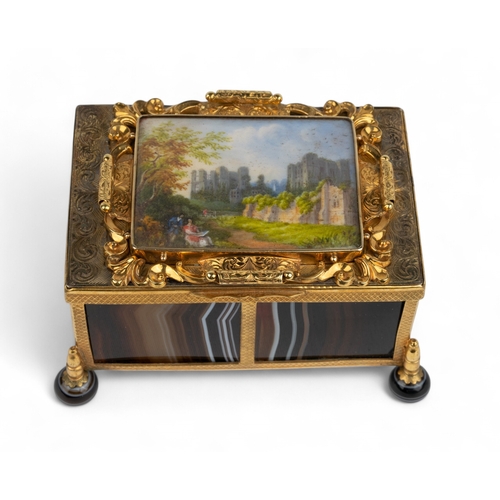 670 - 19th Century,A small lidded agate box with central enamelled picture inserted into the lid on four r... 