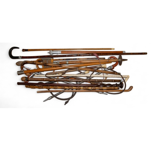 673 - A collection of walking sticks, shooting sticks and hunting cropsTo be sold without reserve... 