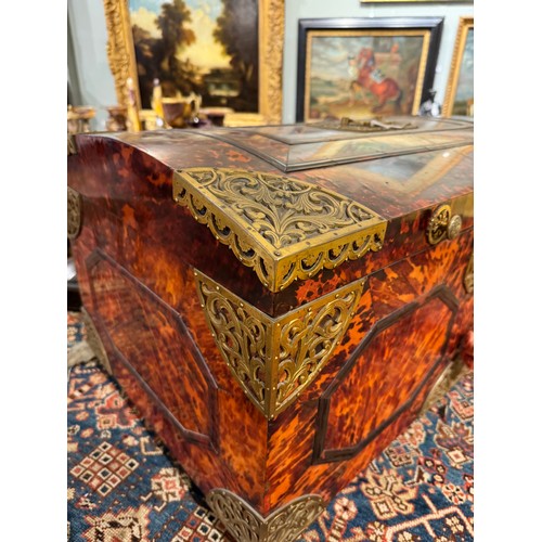 188 - Antwerp17th CenturyA large tortoiseshell brass bound chestThe dome top chest decorated throughout wi... 