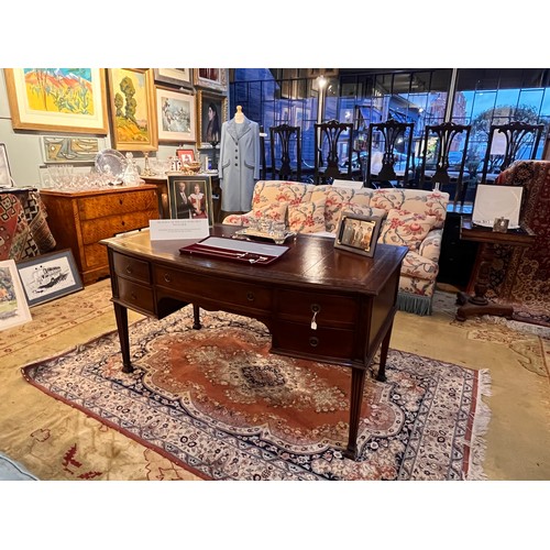 174 - 'The Dormer Desk'An antique five drawer mahogany desk with tooled dark red leather and gilt inset to... 