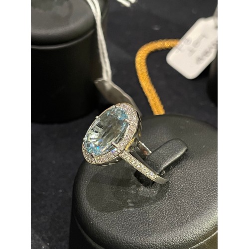 110A - ContinentalContemporaryAn aquamarine and diamond ringThe oval mixed cut aquamarine weighing approxim... 