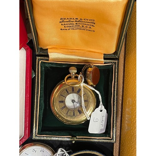 9 - British, Late 19th century,An 18 carat gold half hunter pocket watch with white enamel dial and blac... 