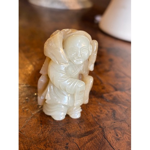 345 - Chinese19th centuryBrown and mutton fat coloured jade boy carrying a deerProperty of a gentlemanFrom... 