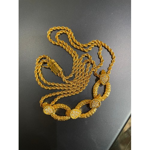 61 - Boucheron Paris, Circa 1990sA fine 18 carat yellow gold and diamond Serpent Boheme necklace. The cla... 