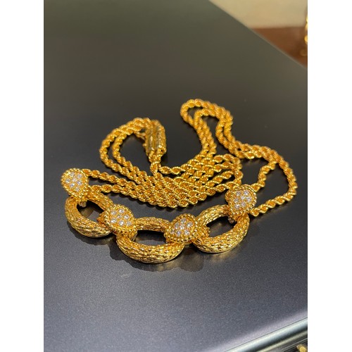 61 - Boucheron Paris, Circa 1990sA fine 18 carat yellow gold and diamond Serpent Boheme necklace. The cla... 