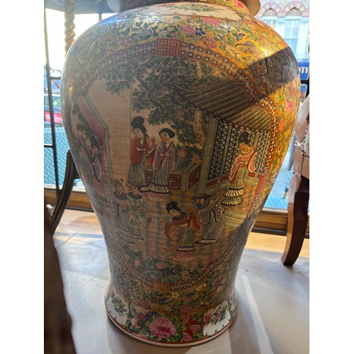 368 - Cantonese20th centuryA pair of famille rose large baluster urns. With birds, butterflies and floral ... 