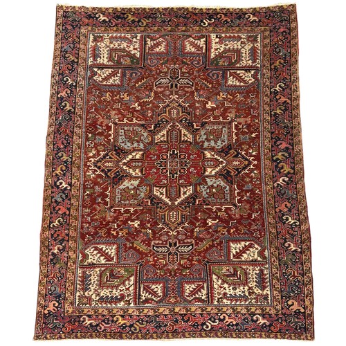 331 - PersianEarly 20th centurya Heriz carpetDimensions:330 cm (L) x 252 cm (W)... 