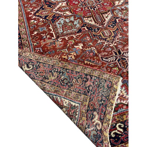 331 - PersianEarly 20th centurya Heriz carpetDimensions:330 cm (L) x 252 cm (W)... 