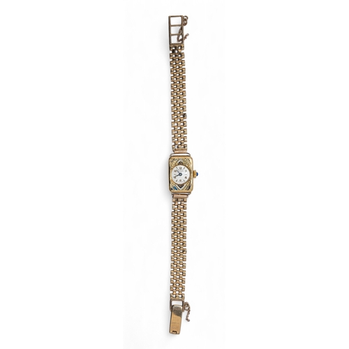 18 - Doric, Circa 1930A fifteen carat gold wristwatch with circular dial and enamel border and later nine... 