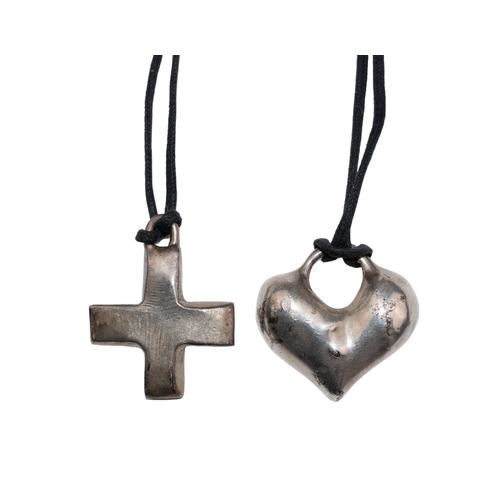 20 - Robert Lee Morris (American, b. 1947) Two sterling silver pendants, one a heart and one a cross.Toge... 