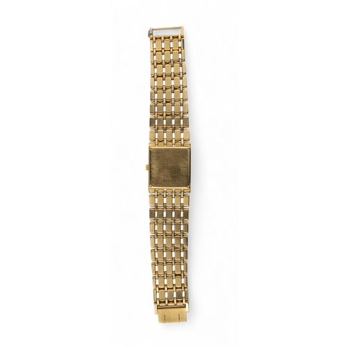 26 - Piaget1980s A gentleman's 18 carat yellow gold wristwatch. With square-shaped brushed gold dial on a... 