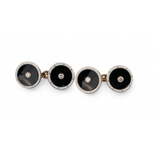 3 - EdwardianA pair of diamond, onyx and white enamel 9 carat gold cufflinks.Total approx. weight: 6.99 ... 