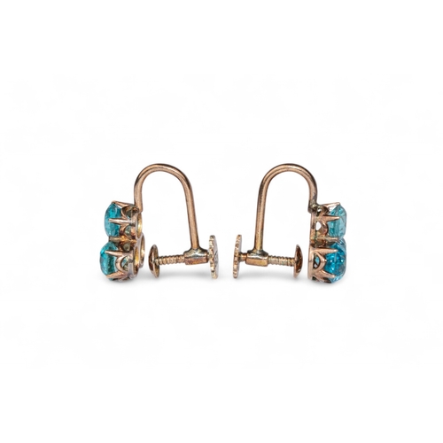 57 - AntiqueA pair of blue zircon and yellow gold trefoil cluster earrings.Total approx. weight: 2.66 g.... 